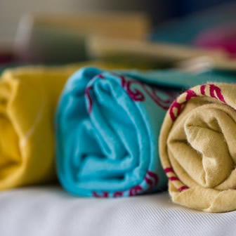 hand-dyed and silk-screened tea towel favors